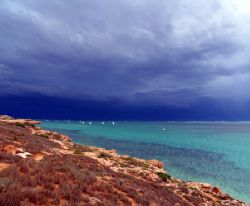 Storm clouds over Coral Bay, Western Australia by Penny Murphy 